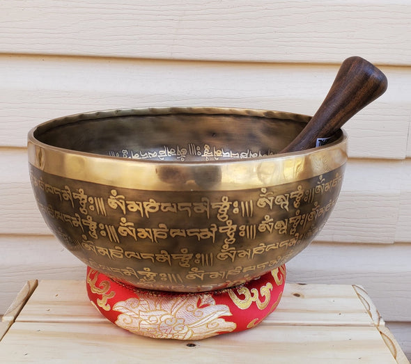 Handmade singing bowl with eight auspicious symbol 10.5"